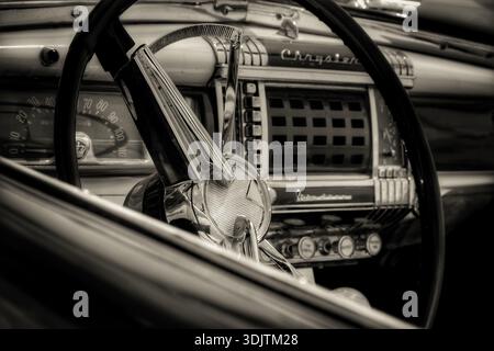 Mid‑century Chrysler Windsor dashboard in sepia tone Stock Photo