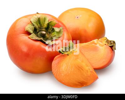 Ripe persimmon fruit and two persimmon slices on white background. File contains clipping path. Stock Photo
