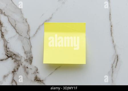 Colored Blank empty Sticky Sticker Pasted On White isolated Wall, Creative copy Space For Text Stock Photo