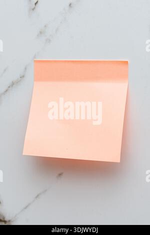 Colored Blank empty Sticky Sticker Pasted On White isolated Wall, Creative copy Space For Text Stock Photo