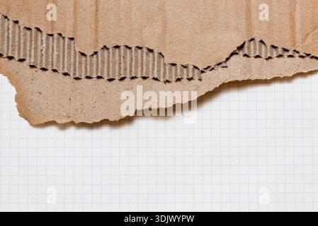 Crumpled old cardboard paper on isolated white background, old textured sheets with torn edges and copy space for text Stock Photo