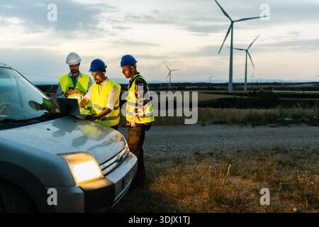 Engineers working on renewable wind energy project Stock Photo