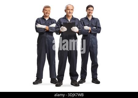 Team of mechanics posing with arms crossed isolated on white background Stock Photo
