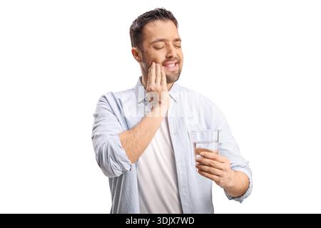 Man suffering from sensitive teeth and toothache isolated on white background Stock Photo
