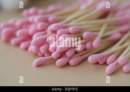 Colorful cotton swabs placed on a flat surface Stock Photo