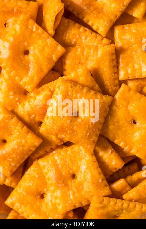 Savory Salty Cheese Cracker Squares to Snack on in a Bowl Stock Photo