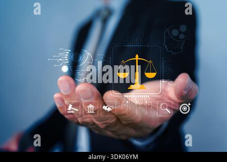 Businessman presenting digital justice scales interface, symbolizing legal technology, compliance, contract management, and AI-driven law services for Stock Photo