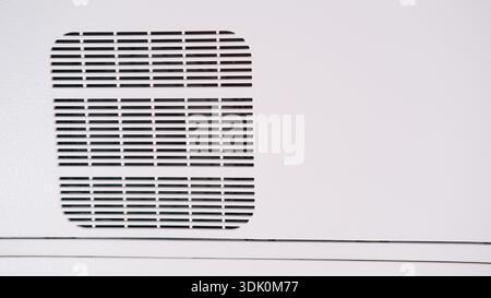 Air vent panel inside airplane cabin above passenger seat . Ventilation and temperature regulation in plane. Maintenance of aircraft vehicle Stock Photo