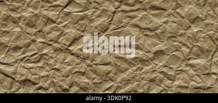 Crumpled Brown Kraft Paper Texture Background with Wrinkled Surface Pattern Copy Space Stock Photo