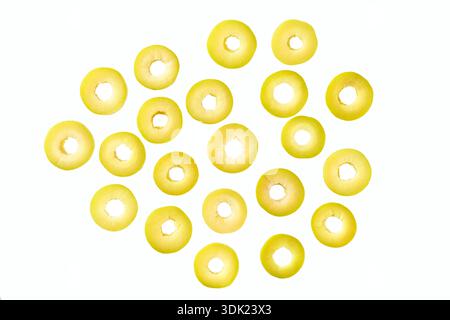 Slices of delicious pikled green olive isolated on white.Top view. Stock Photo