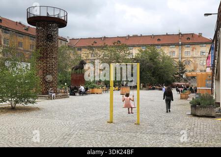PRAGUE, CZECH REPUBLIC - MAY 3, 2024: People visit Karlin Barracks (Kasarna Karlin) converted to public space in Prague, Czech Republic. Stock Photo