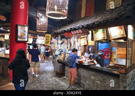 SINGAPORE CITY, SINGAPORE - MARCH 13, 2024: People visit food court Food Republic in VivoCity shopping mall in Harbourfront in Singapore. Stock Photo