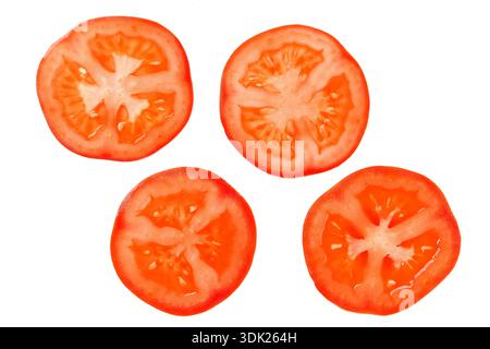 red tomato slice top view isolate.  Set of round tomato slices. Stock Photo
