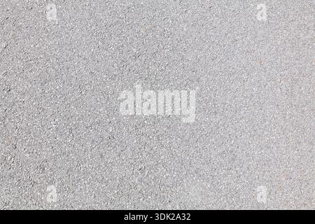 Road surface background. Asphalt bright grey blacktop road texture. Stock Photo