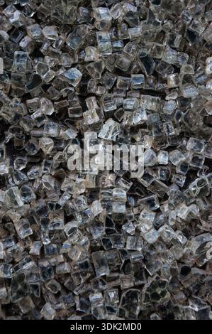 Abstract background of broken glassy cubes. Dirty surface. Stock Photo