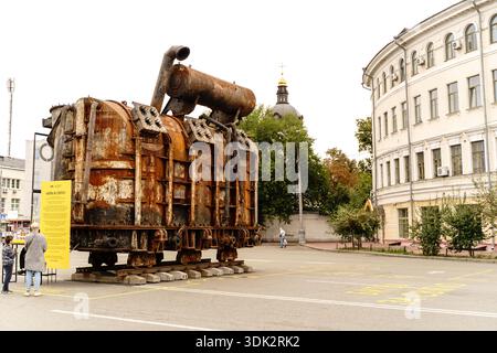 A power transformer burned by a rocket in a square in Kyiv, Ukraine. Stock Photo