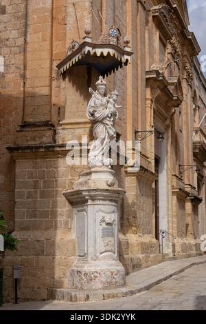 Statue of Our Lady of Mount Carmel - Blessed Virgin Mary with Child in Mdina, Malta. Located on the corner of Church of the Annunciation - the Carmeli Stock Photo