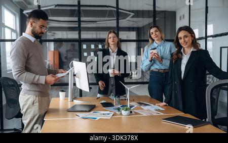 Planning the project. Business people are working in the office. Stock Photo