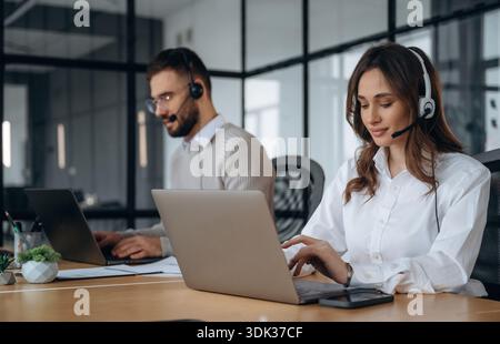 Man and woman are working in the office. Stock Photo