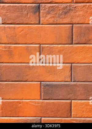 Orange Brick Wall Texture Terracotta Masonry Pattern High Resolution Vertical Architecture Wallpaper Background Photography. Stock Photo