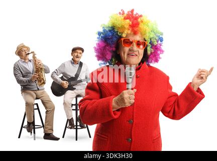 Funny seniors playing guitars and signing isolated on white background Stock Photo