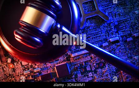 A judge’s gavel resting on a glowing circuit board, symbolizing the intersection of law, justice, and advanced digital technology in modern legal syst Stock Photo