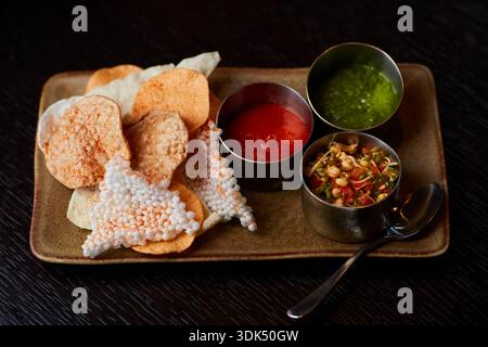 Indian snacks with dips Stock Photo