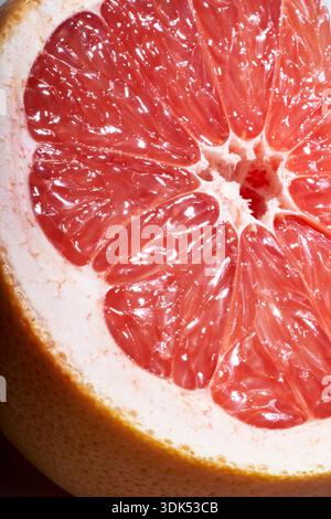 Close-up of sliced pink grapefruit Stock Photo