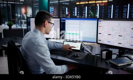 Busy Financial Accountant And Analyst Working On Charts Dashboard Online Stock Photo