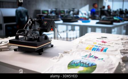 Proud Latino Man Prints Custom T-Shirts With Heat Transfer Machine Stock Photo