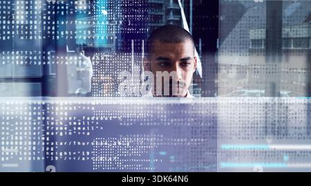 Programming, hologram and man on computer in office for system maintenance, coding and debugging. UX design, web developer and PC with overlay for Stock Photo