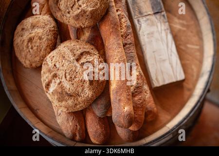 Overhead view looking down on different types of fresh breads Stock Photo