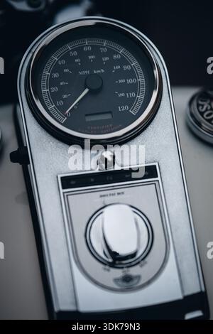 Close-up of a vintage motorcycle speedometer and control panel parked near Lincoln Cathedral, Lincoln, England, United Kingdom. Stock Photo