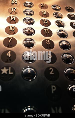 metal buttons in an elevator Stock Photo
