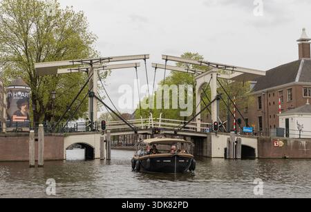 A double draw lift bridge over the canal in Amsterdam Netherlands Stock Photo