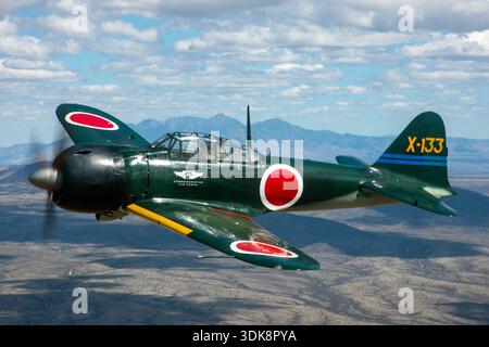 This image shows a Japanese Zero aircraft stationed on the tarmac at ...