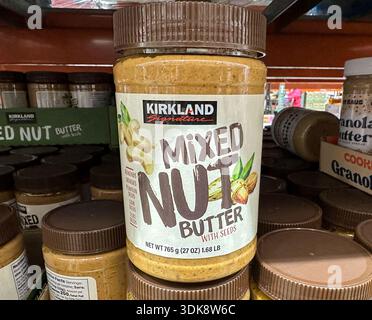 Close up of a jar of Kirkland Mixed Nut Butter on a shelf at a Costco store. Merrillville, IN USA - January 29, 2026 Stock Photo