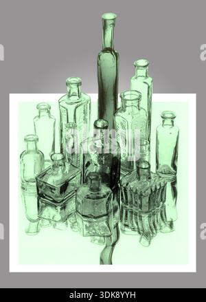 Pleasant arrangement of vintage or antique glass bottles (including inkwells etc) of varying sizes with bottles reflected on surface below. Stock Photo