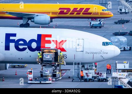FedEx Express Boeing 777-FS2 cargo plane is unloaded, air freight