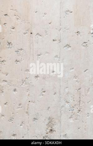 Rough concrete wall texture with natural surface imperfections Stock Photo