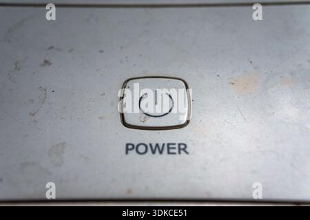 Macro composition of the plastic Power button on an old device. Stock Photo