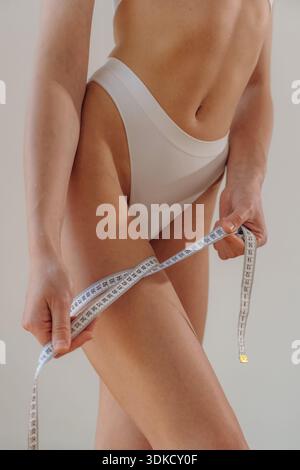 Close up view of woman that is in fitness clothes. Stock Photo