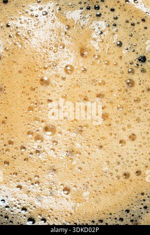 Brown and gold coffee bubbles texture for culinary background Stock Photo