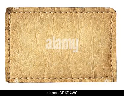 Worn brown leather label with white stitching, offering a rustic texture for branding or design Stock Photo