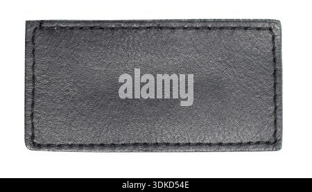 Black leather patch with stitched edges provides customizable branding space on a transparent background Stock Photo