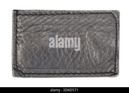 Black leather patch with stitch marks on transparent background, showing worn texture Stock Photo