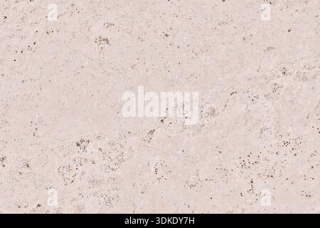 Macro view of a beige volcanic stone surface with mineral inclusions and porous grain. Natural rock texture background for architectural design and 3D Stock Photo