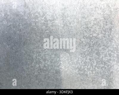 Zinc galvanized grunge metal texture. Old galvanized steel metal texture background. Close-up of a galvanized gray zinc plate texture background Stock Photo