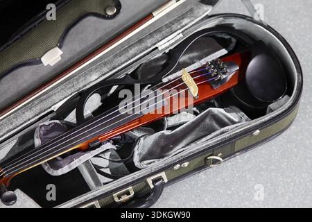 Electric violin in a case Stock Photo