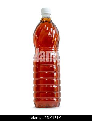 Fish sauce in transparent plastic bottle is isolated on white background with clipping path. Stock Photo